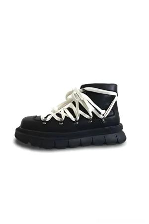 Black leather platform combat boots with off-white contrast laces and chunky lug rubber sole side view