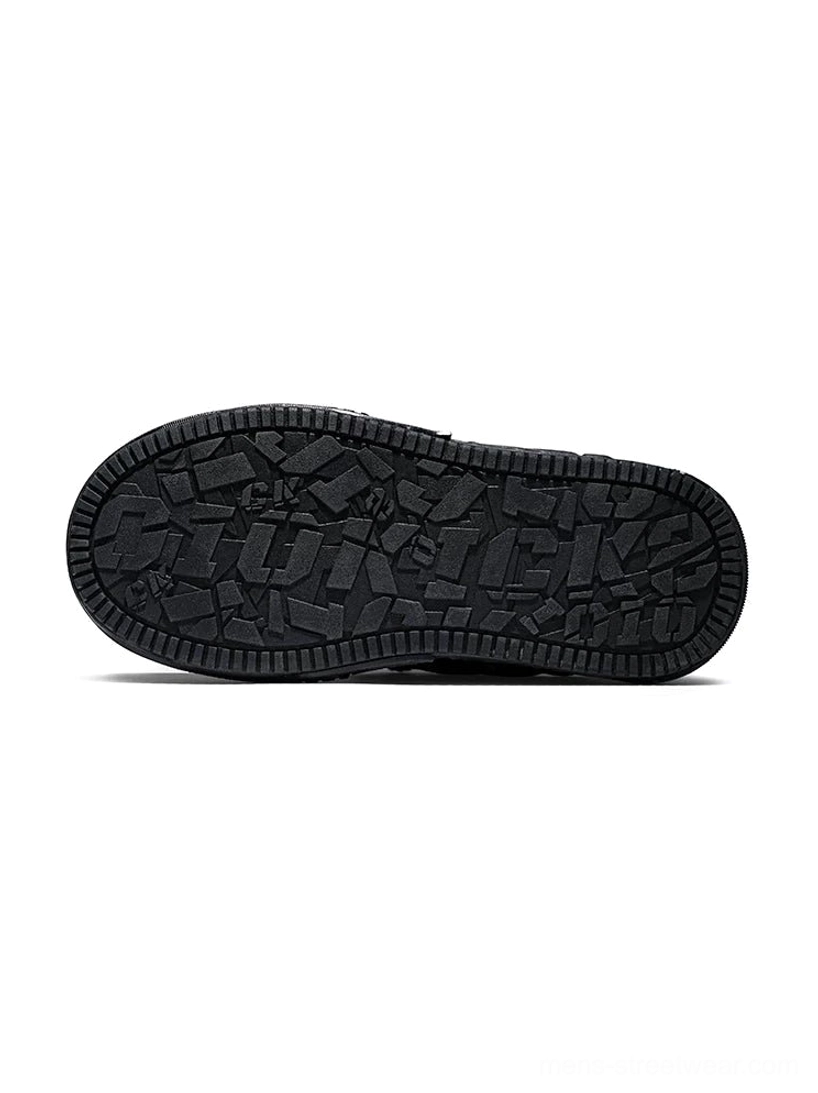 Textured cracked pattern rubber outsole detail on black leather platform streetwear sneaker