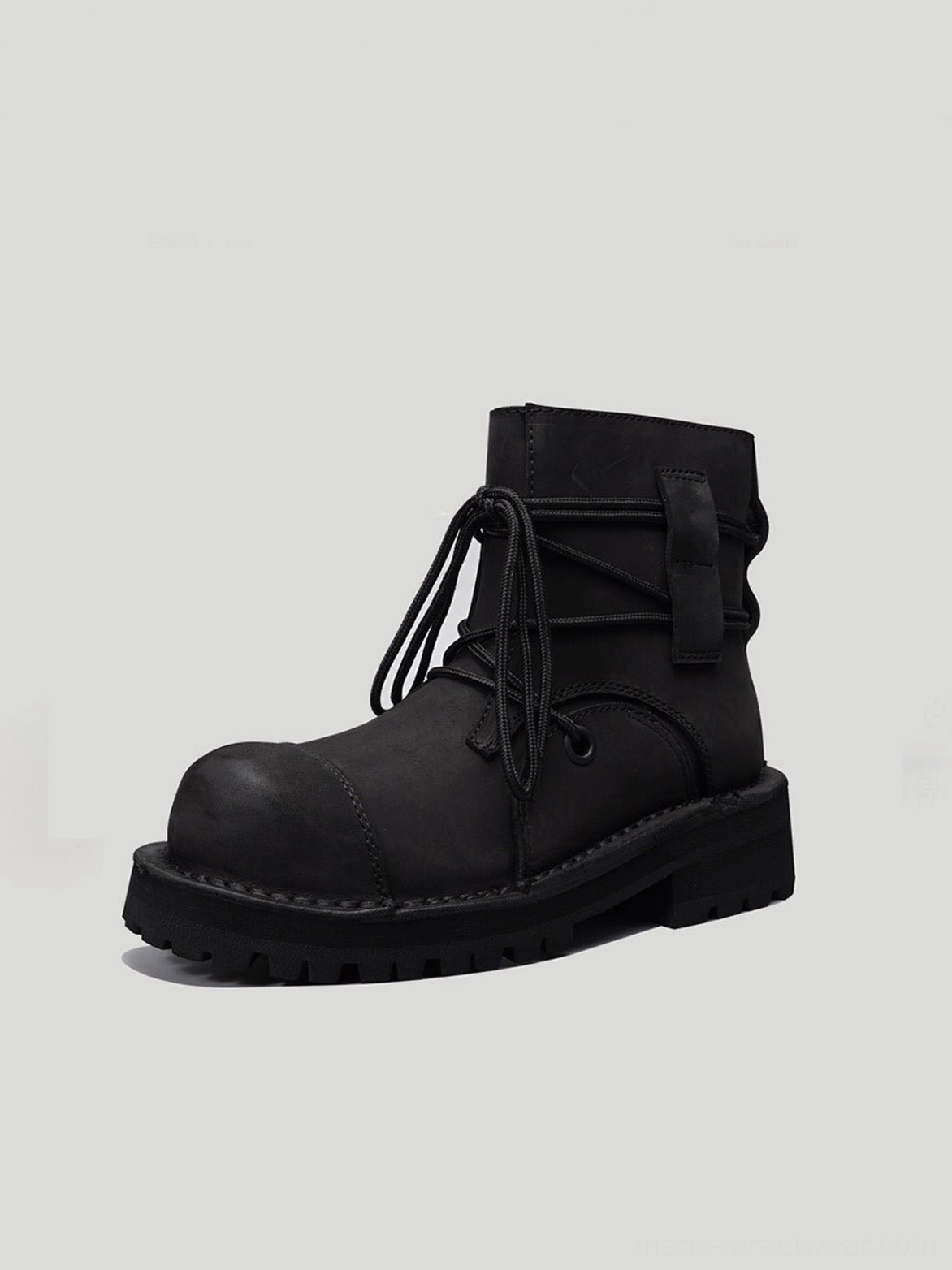 Black leather utility ankle boot front three-quarter product view with rounded toe padded collar and treaded outsole