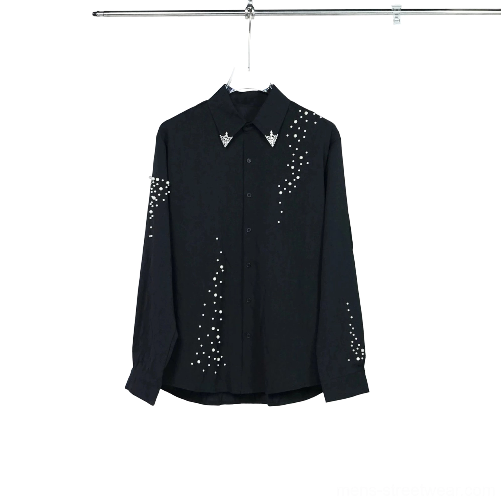 Black long-sleeve studded constellation button-down shirt displayed on a clothing rack with pointed collar, metal triangle collar tips, and relaxed regular fit