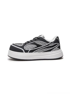 Black and white mesh panel platform derby sneakers shown in a side profile studio view with honeycomb textile upper and thick elevated white outsole
