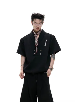 Black Korean streetwear sports suit with metal shawl collar details, short sleeve pullover top, and relaxed wide-leg pants