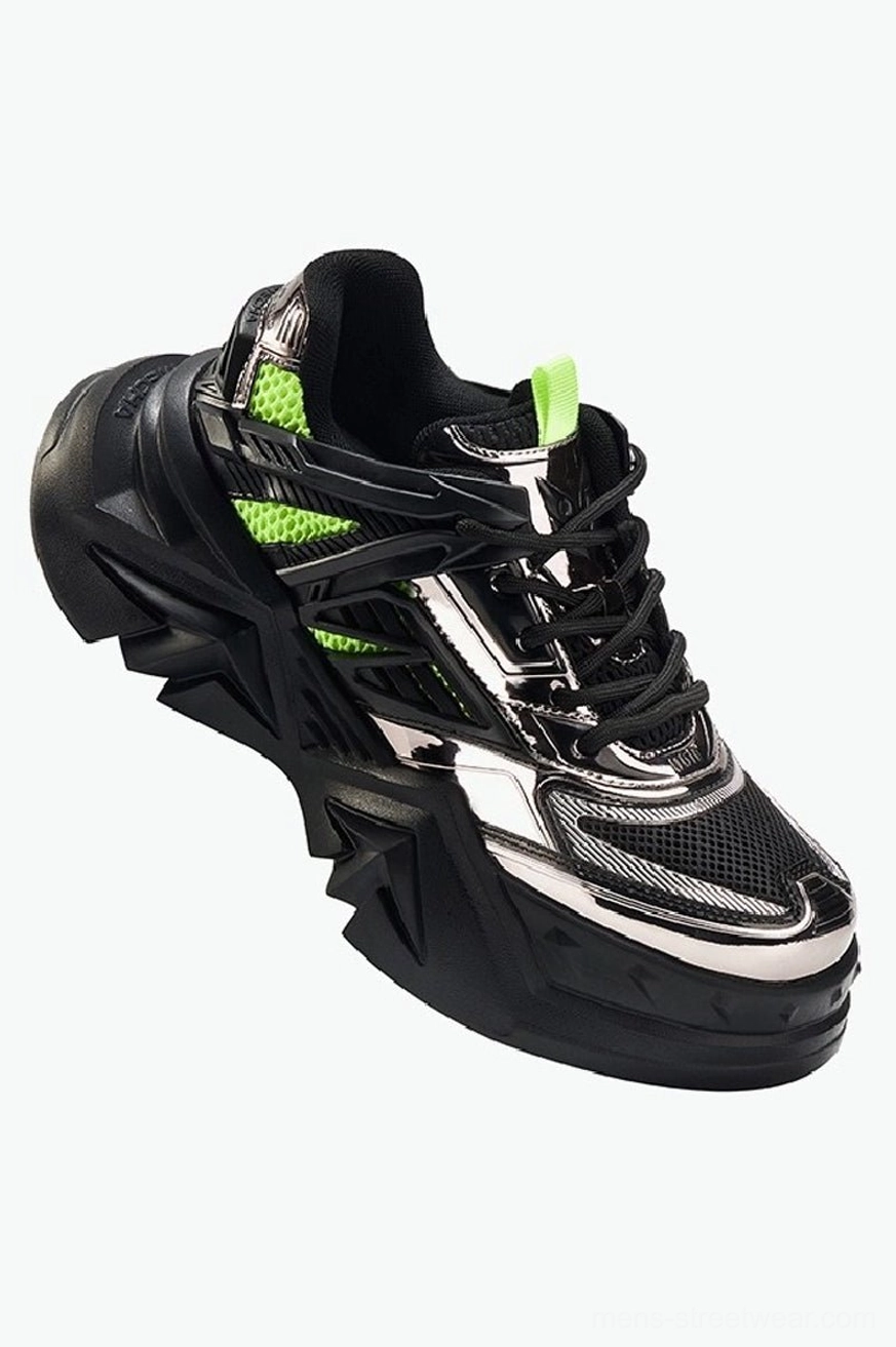 Dynamic side view of black and neon green breathable chunky sneakers with silver panels and futuristic techwear sole