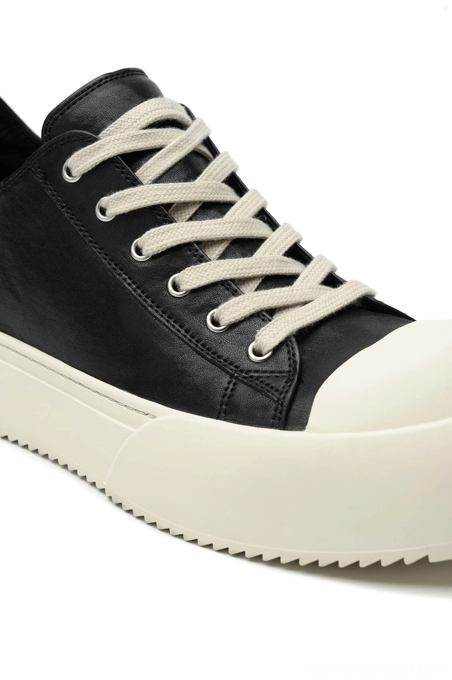 Black Oreo low-top platform streetwear sneakers alternate product angle showing the black upper and round toe