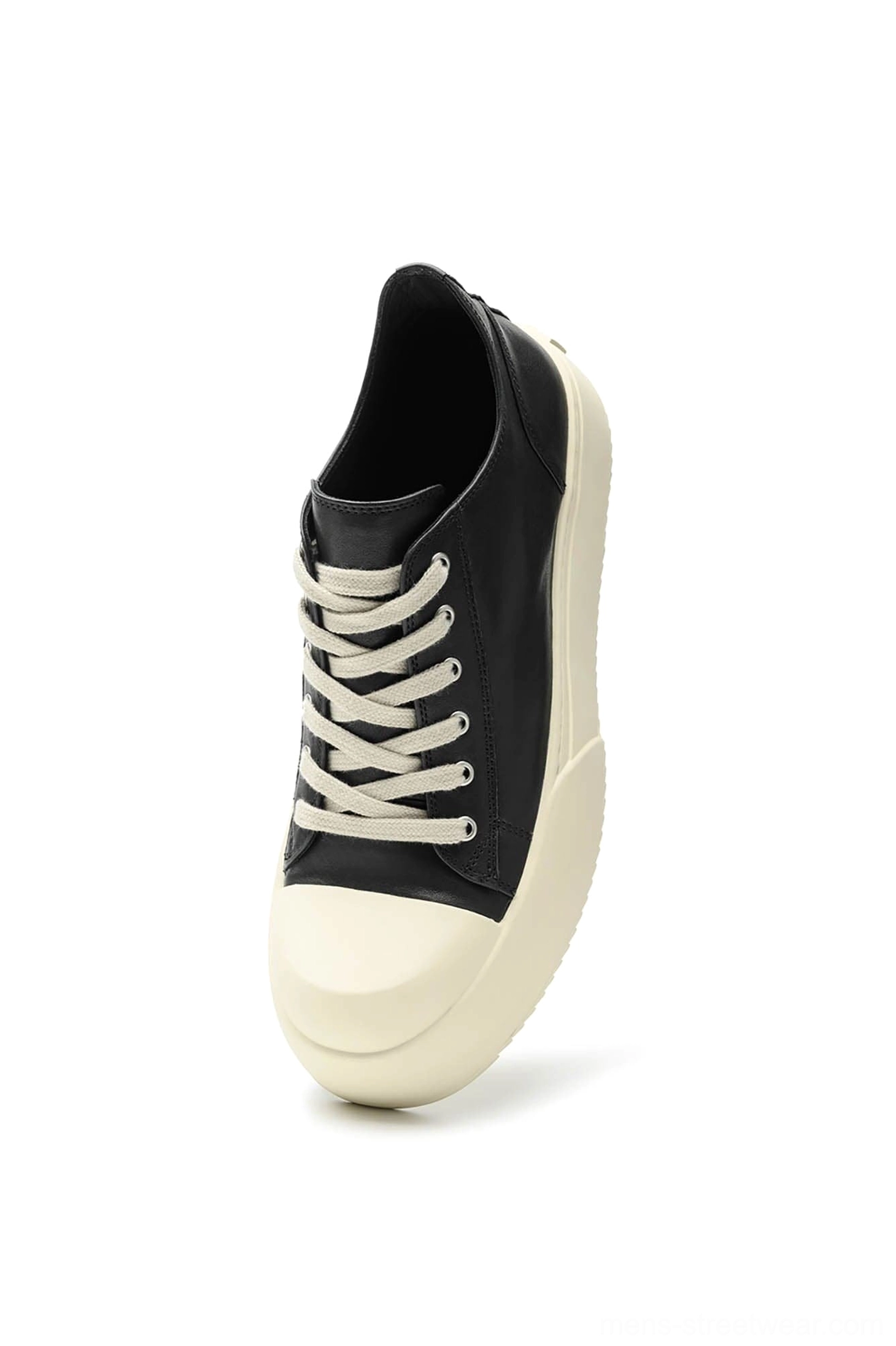 Black Oreo low-top platform streetwear sneakers three-quarter product view with lace-up black upper and off-white outsole