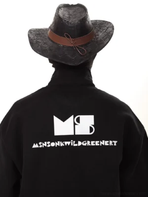 Black oversized cotton polo sweatshirt shown from the back with bold graphic print and relaxed dropped shoulder streetwear silhouette