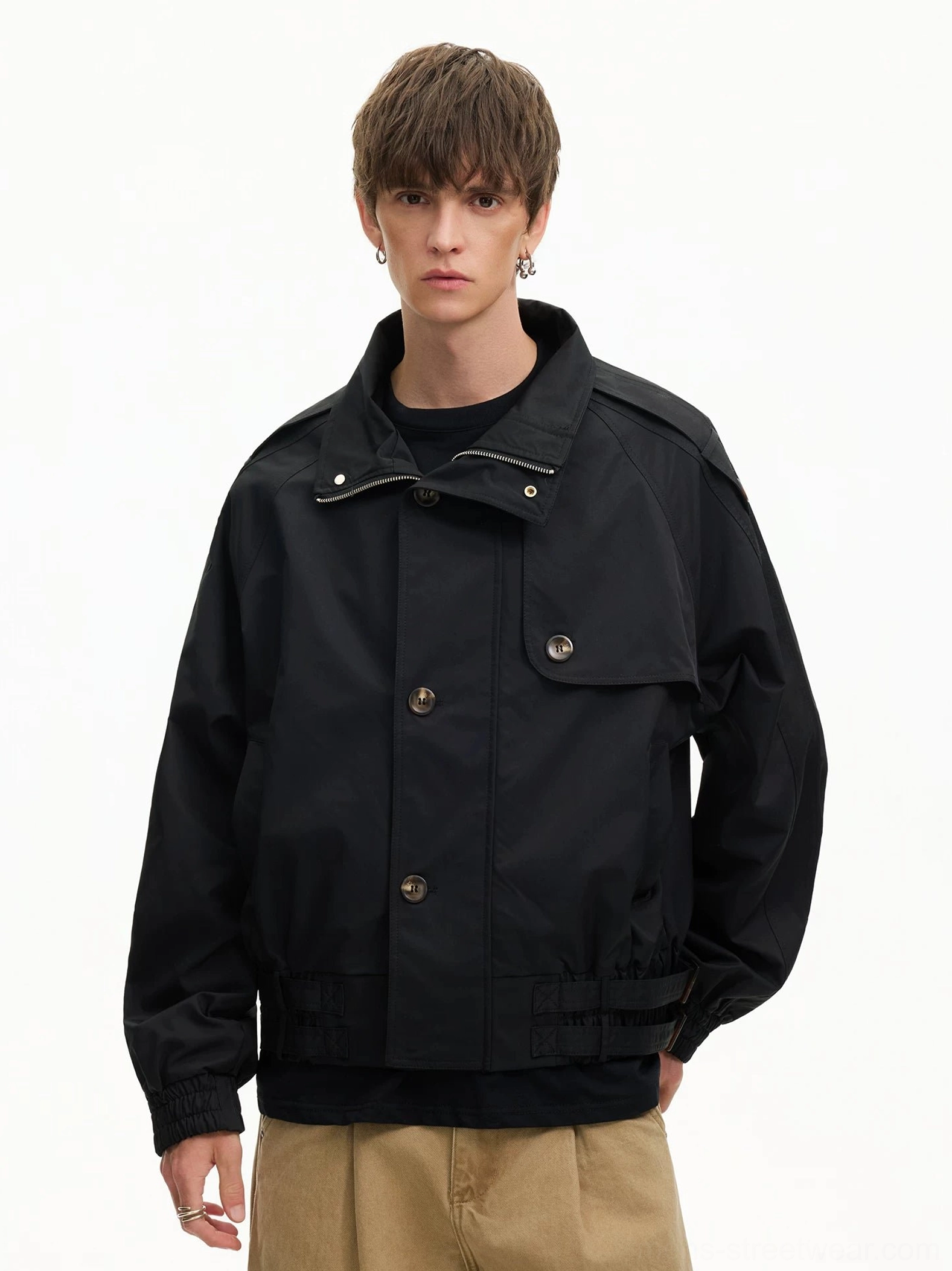 Black oversized cropped windbreaker jacket with chest flap pocket stand collar and adjustable hem fastener straps