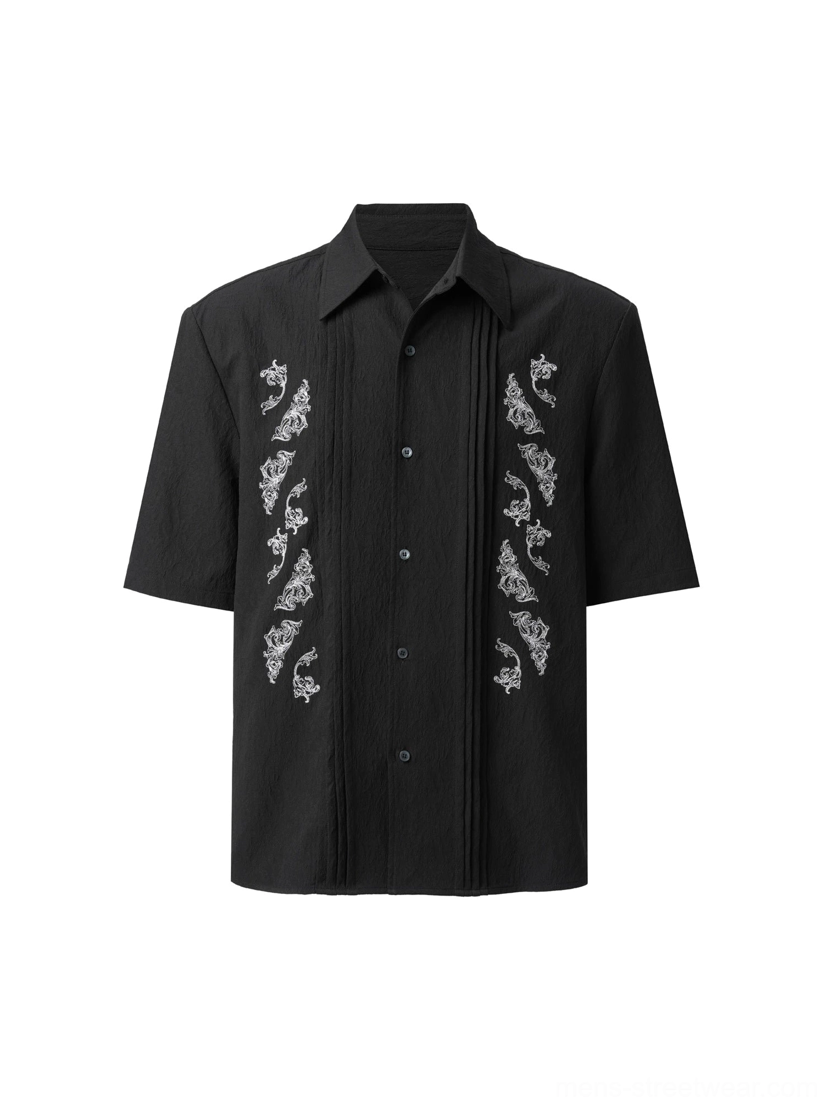 Flat lay front view of oversized black dragon embroidered Cuban shirt with symmetrical silver embroidery