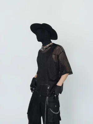 Black oversized grid mesh tee shown from a left three-quarter view with breathable open texture, crew neck, and goth streetwear styling