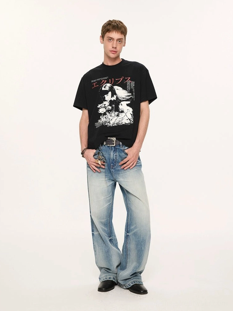 Full-body view of black oversized Japanese anime graphic T-shirt styled with light blue vintage jeans