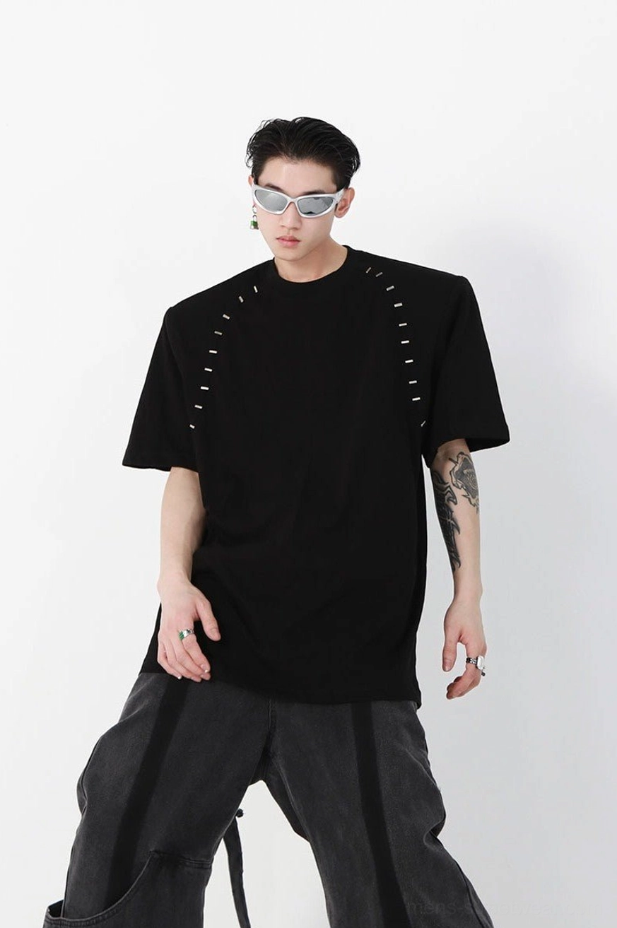 Black oversized cotton crew neck T-shirt with structured padded shoulders and staple-inspired seam detailing in a modern Korean streetwear outfit