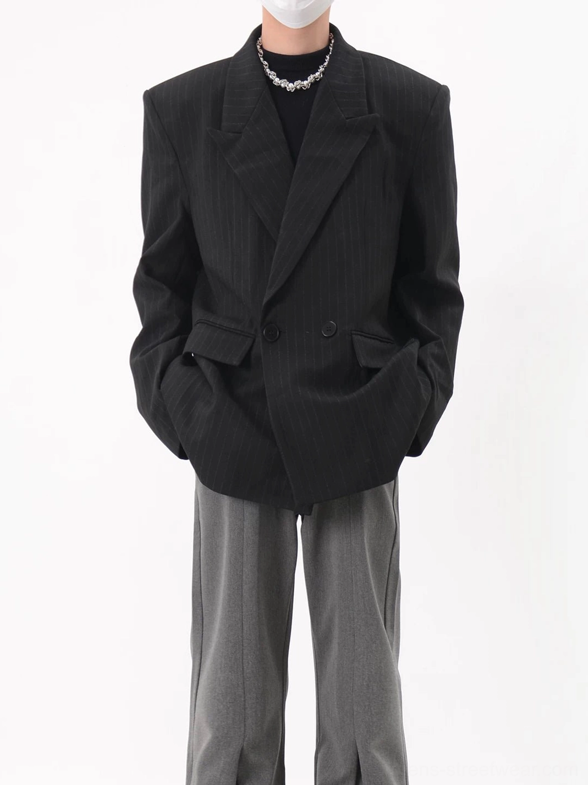 Black oversized pinstripe double-breasted blazer with a longline silhouette styled for minimalist Seoul streetwear