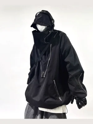 Black oversized tactical hooded jacket shown from the front three-quarter view with high neck, multiple silver zippers, and adjustable hem