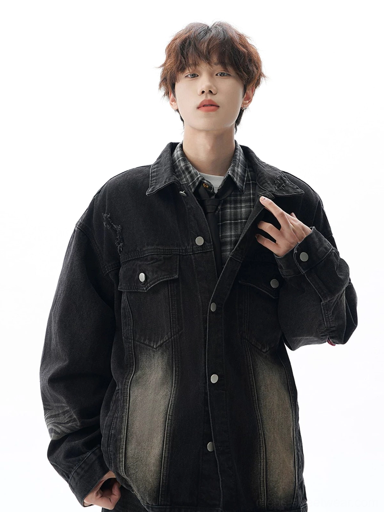 Black oversized vintage denim jacket with button front, gradient faded wash, dual chest pockets, and relaxed unisex streetwear silhouette