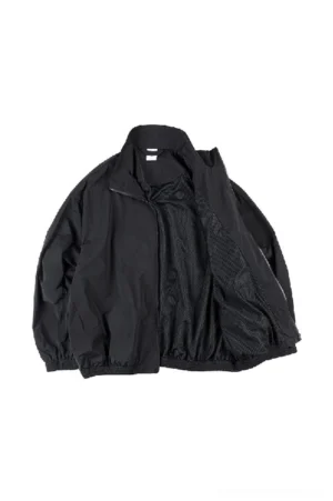 Black oversized zip-up windbreaker jacket open front view showing breathable mesh inner lining and dropped shoulders