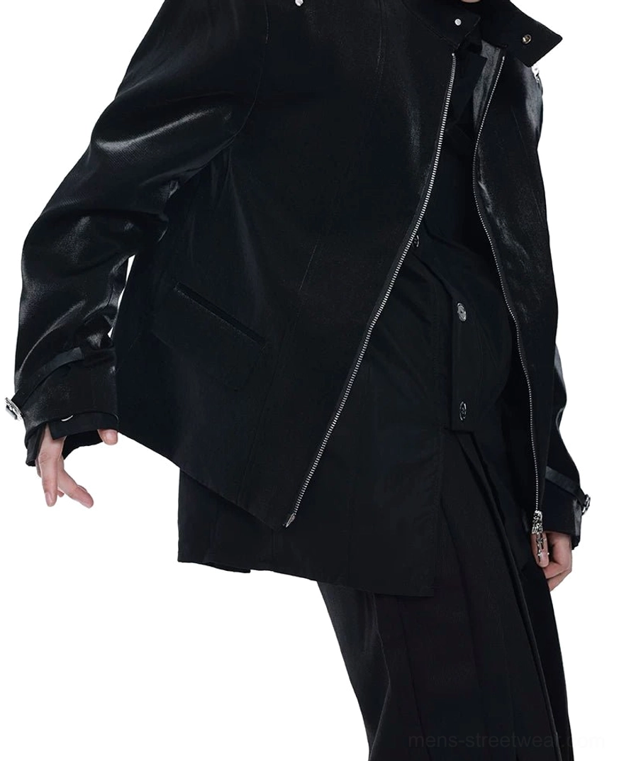 Side three-quarter view of a black patent leather punk blazer featuring a side zipper, flap waist pocket, adjustable cuff strap, and metal buckle