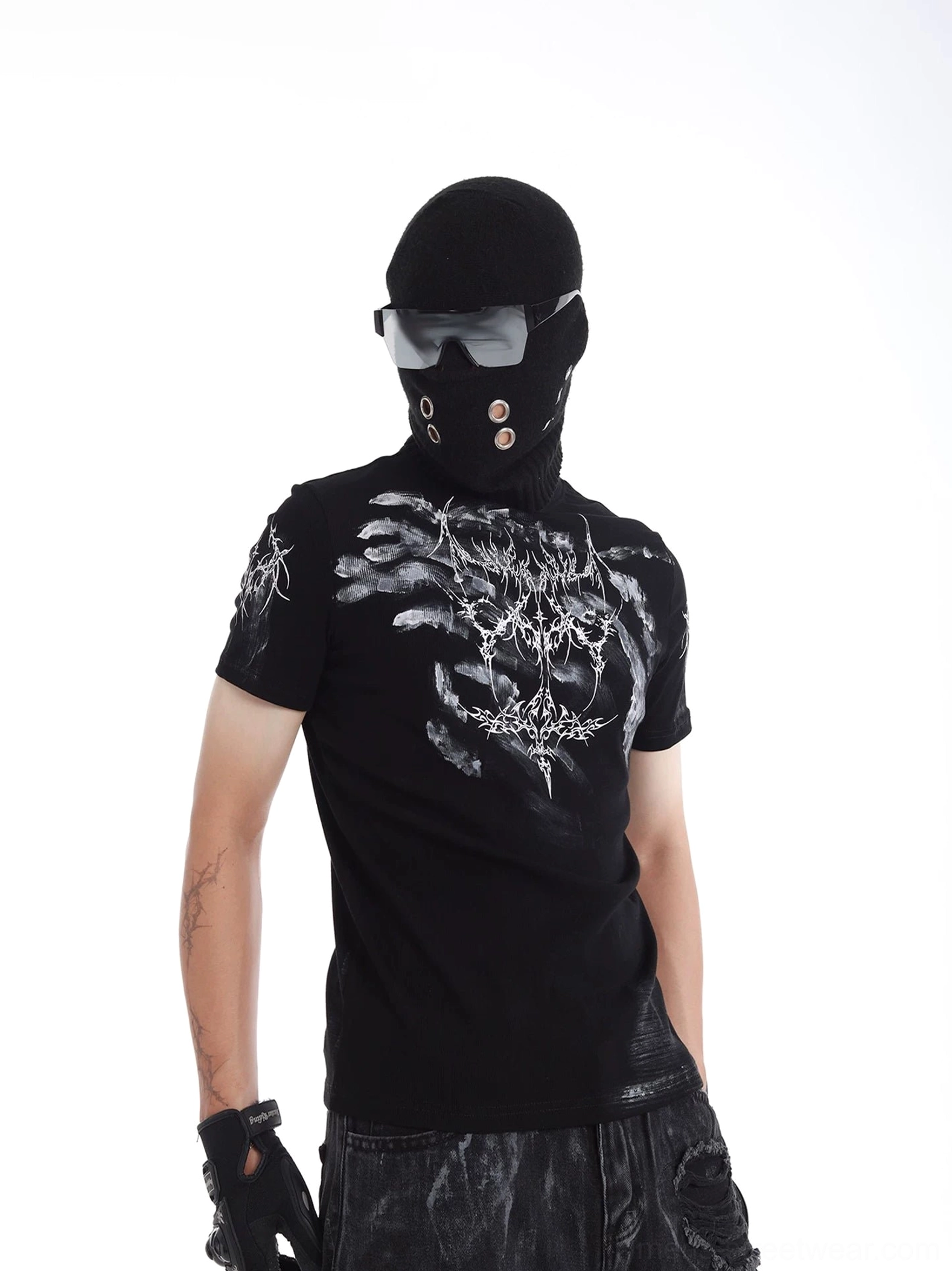 Side view of black Phantom Sigil gothic graphic T-shirt showing silver chest and sleeve prints with black denim styling