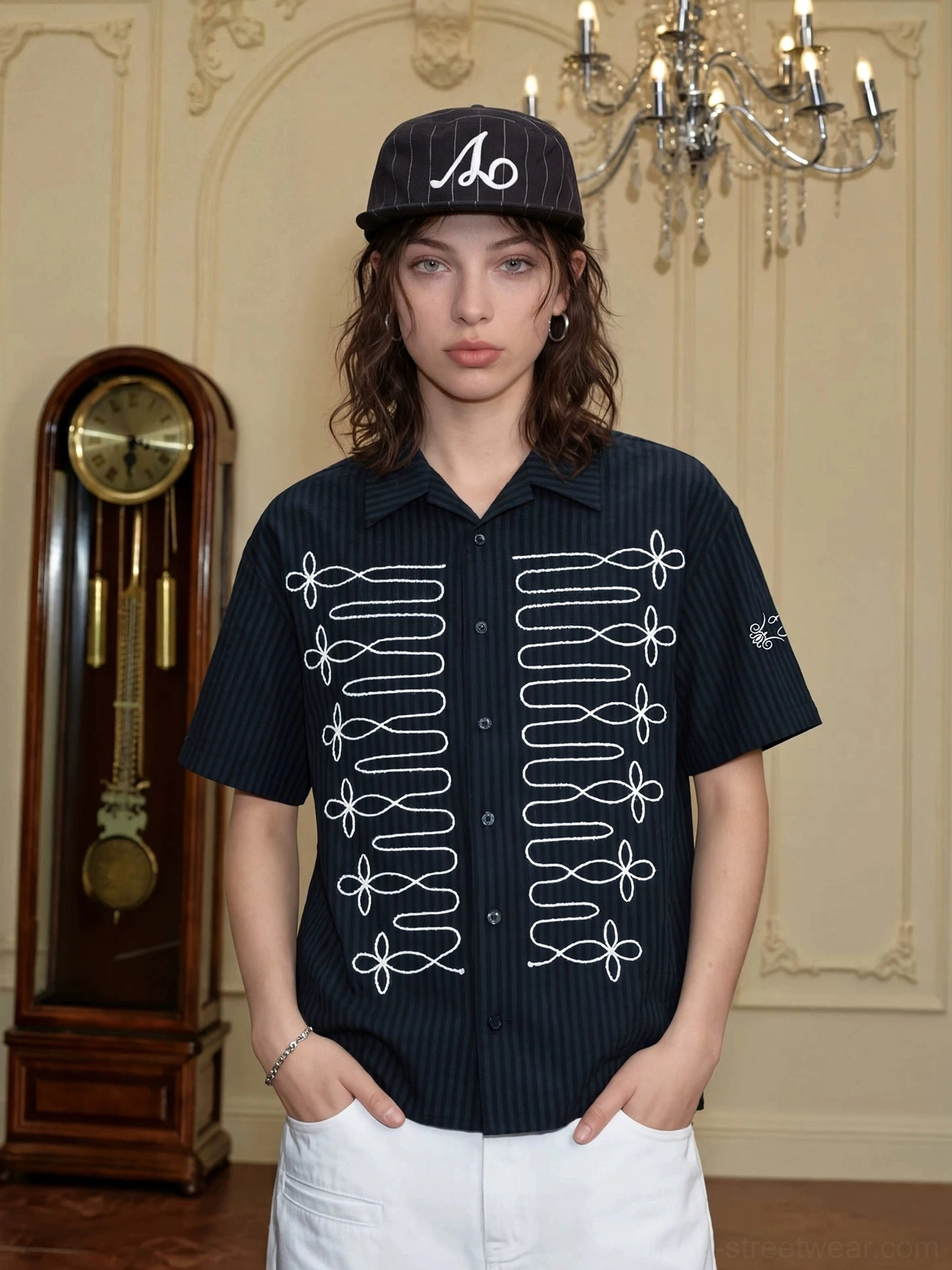 Full body styling view of black pinstripe Korean streetwear short sleeve shirt with contrasting white loop embroidery