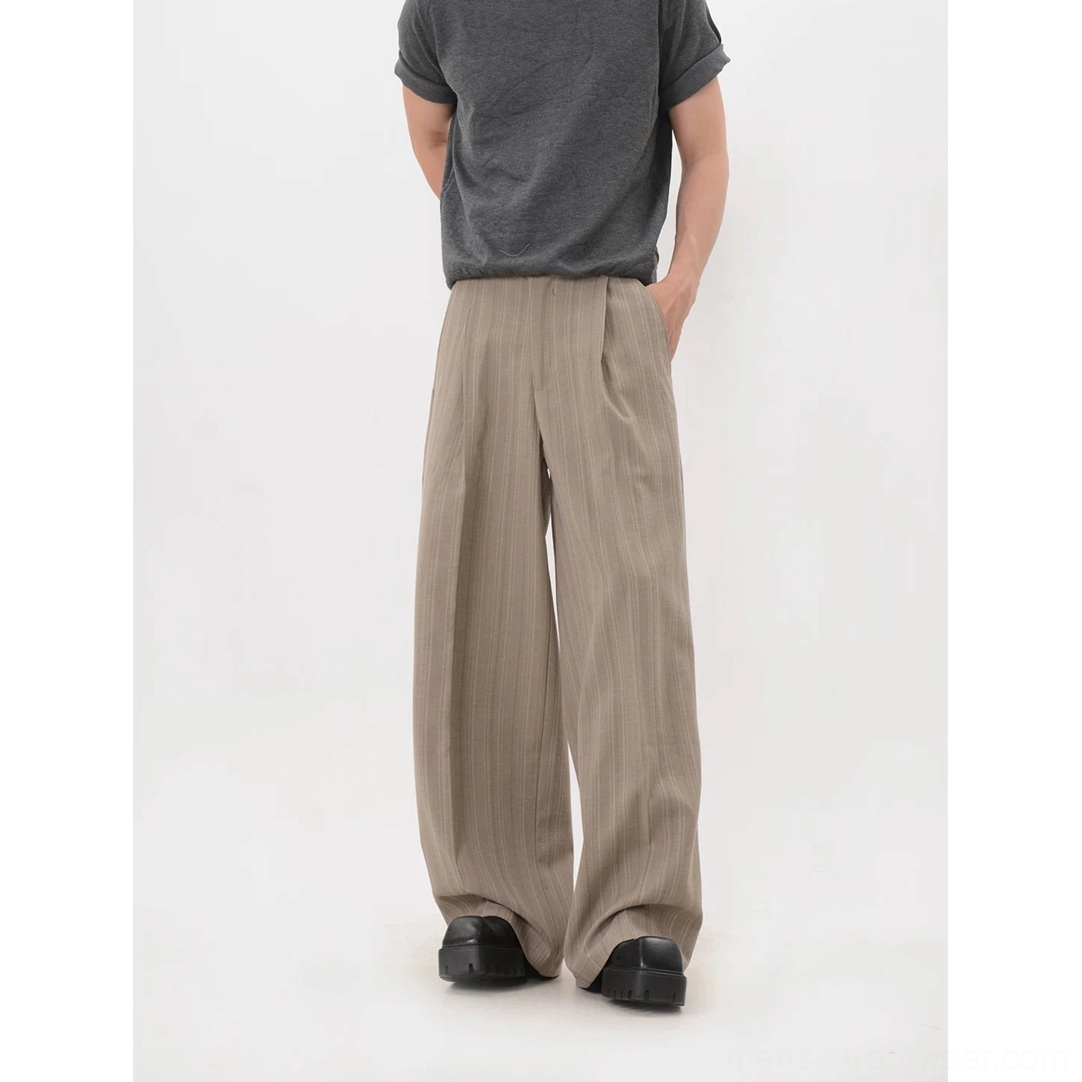 Black pinstripe wide-leg trousers color option with pleated waistband and full-length streetwear cut