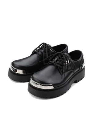 Black platform derby shoes with glossy two-layer cowhide upper, silver metal toe caps, lace-up front, and thick lug rubber outsole on a white studio background