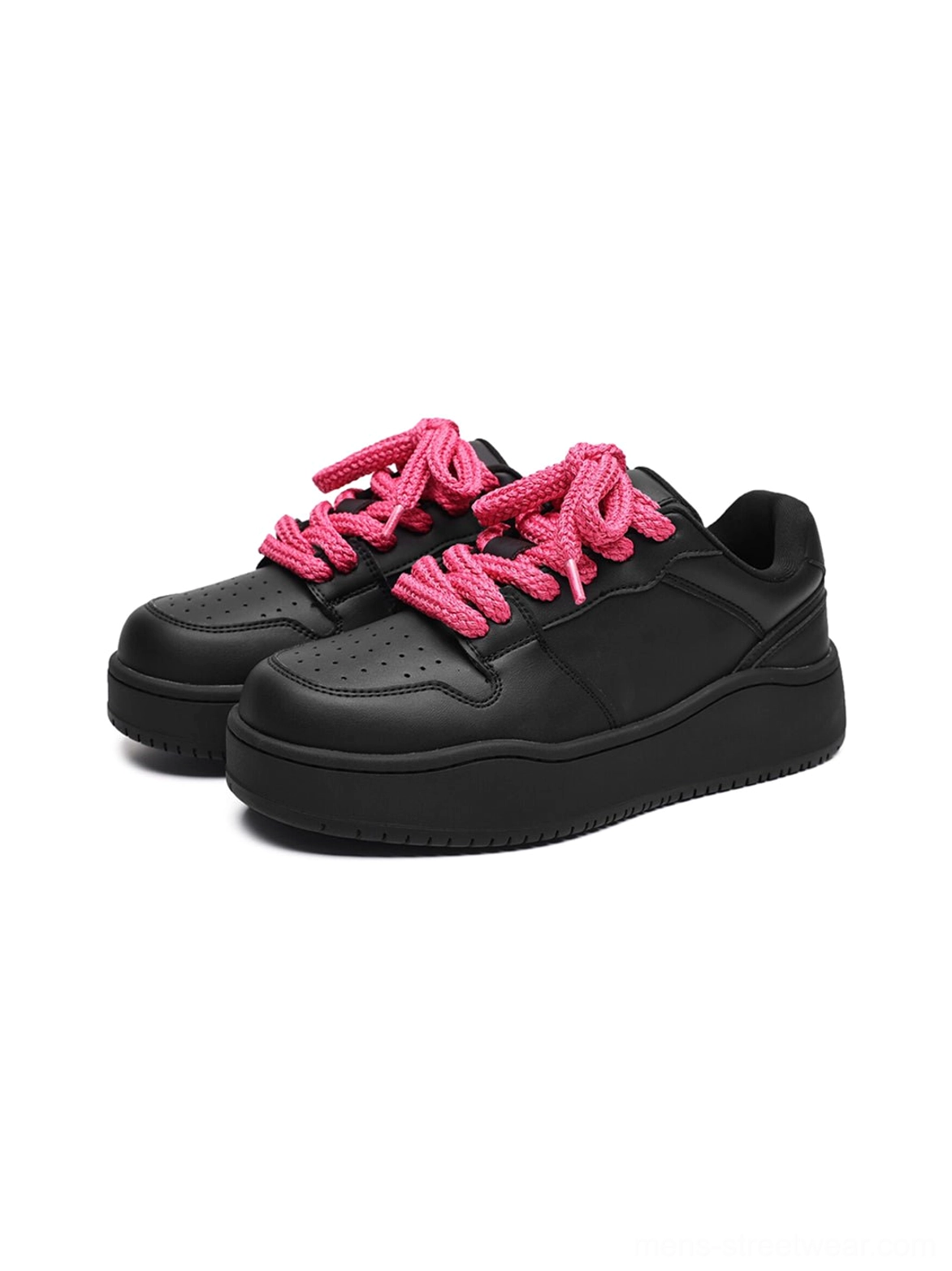 Front three quarter view of black platform sneakers with perforated toe box and contrasting hot pink laces