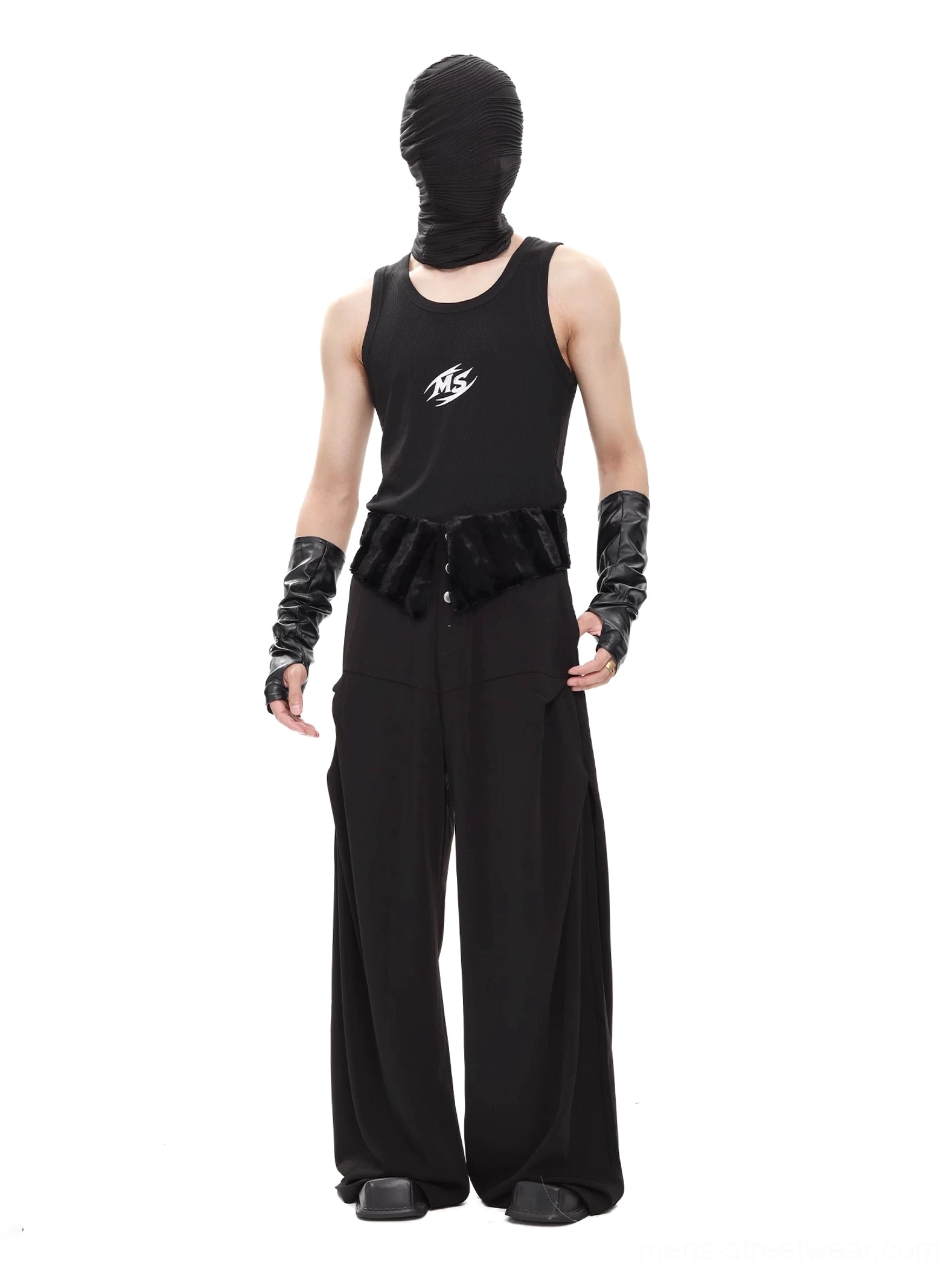 Full body dark streetwear outfit featuring black plush yoke wide-leg trousers with graphic tank top and fingerless gloves