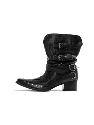 Black pointed toe Western buckle boots with silver hardware, spike studded toe caps, textured synthetic upper, and low block heels shown from the side