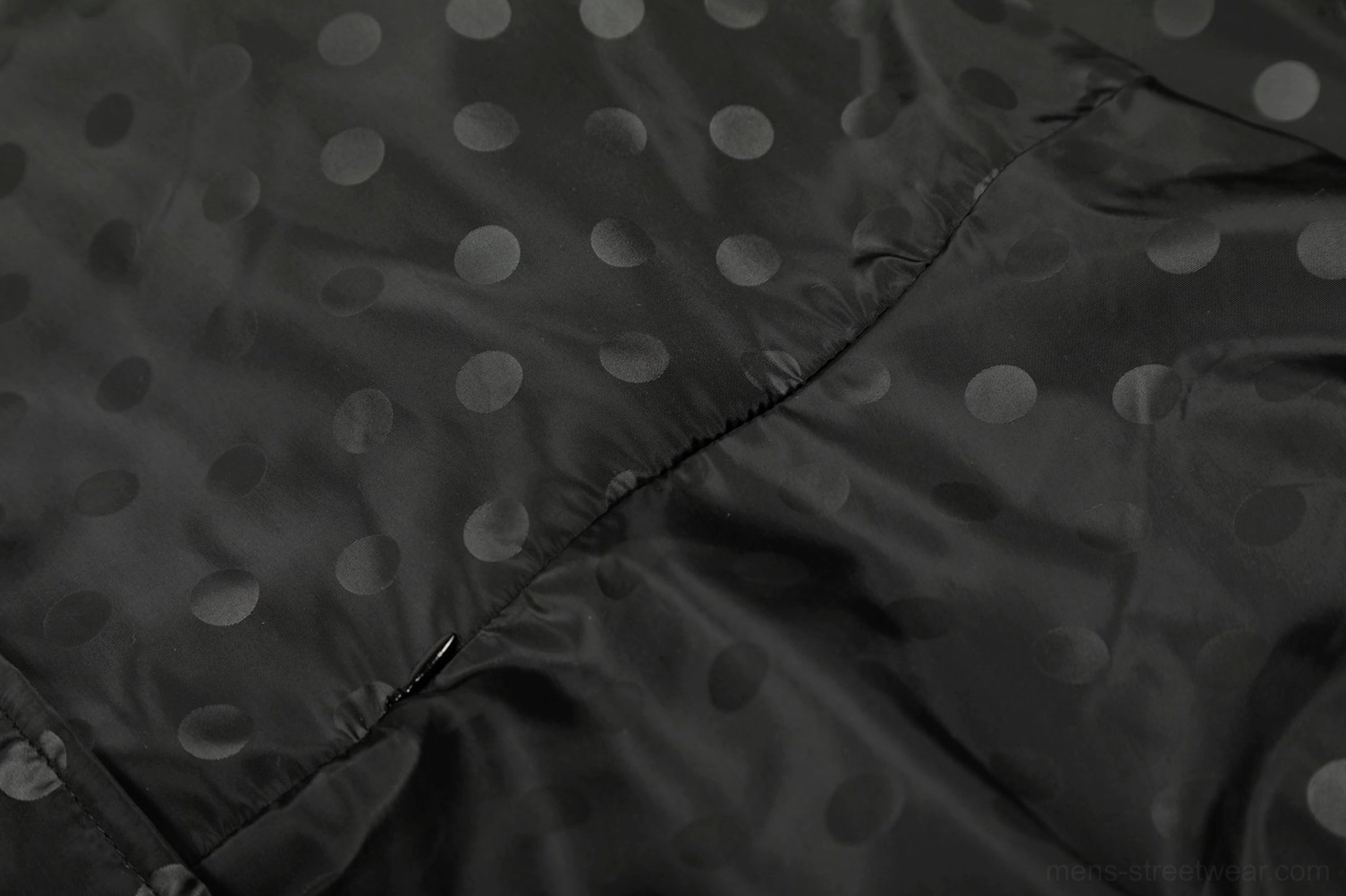 Black polka dot oversized hooded streetwear windbreaker jacket hood and outerwear detail