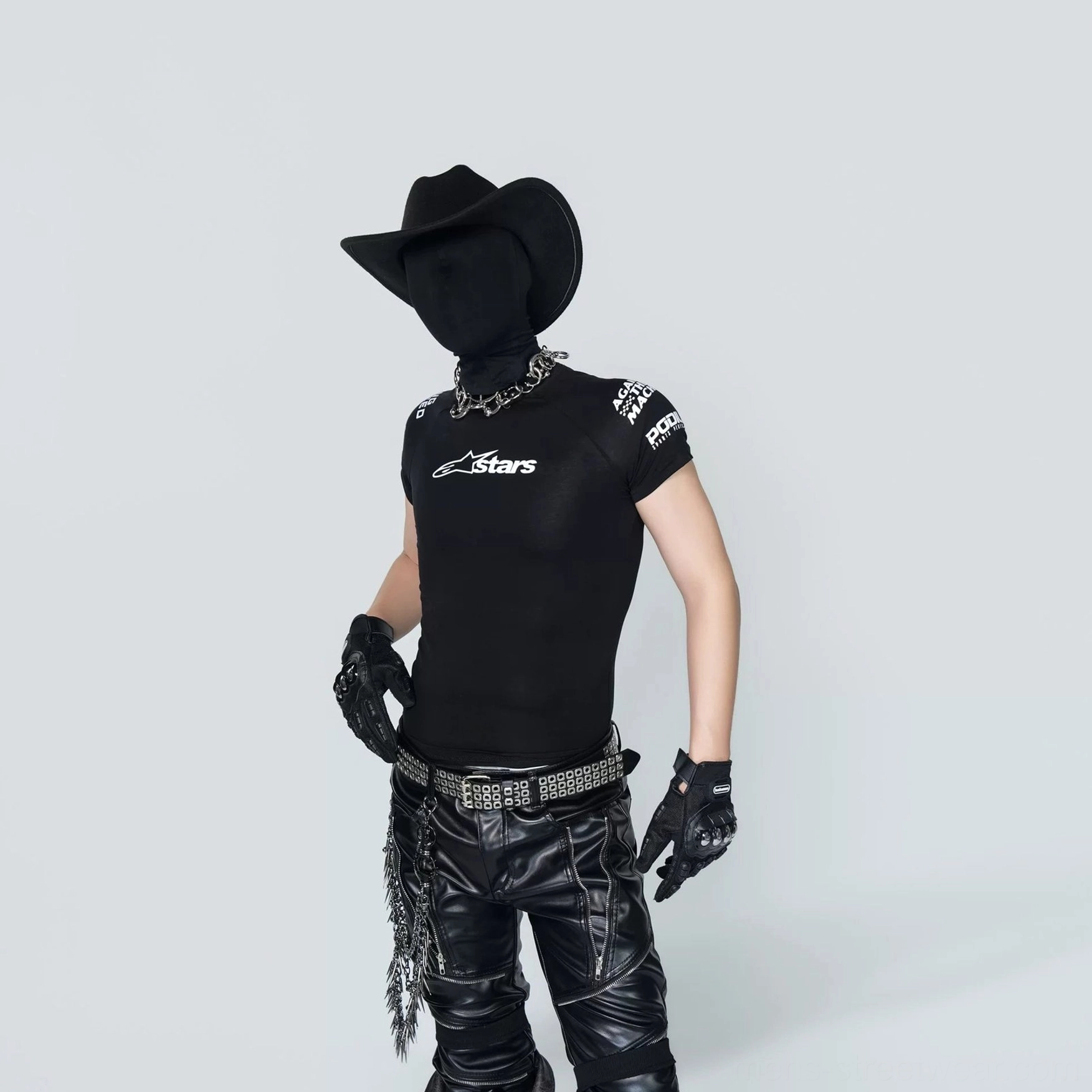 Black racing graphic tee shown from a rear three-quarter view with shoulder branding-inspired details