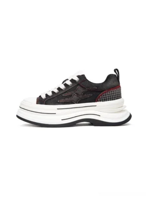 Black and red 7 cm layered platform canvas sneakers shown from the left side with flame-inspired side accents, red plaid heel detail, and thick white multi-layered sole