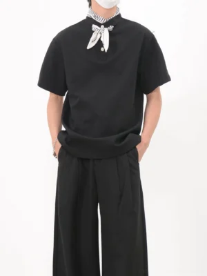 Black relaxed fit bandana collar polo tee with striped bow neckerchief shown from the front in modern Seoul streetwear styling