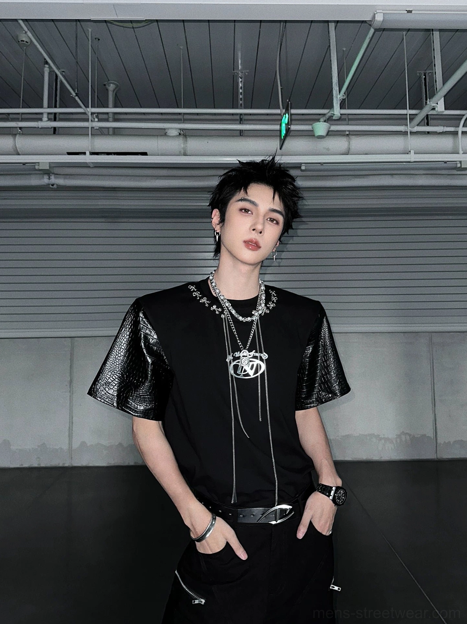 Black relaxed-fit chain lace panel T-shirt with textured faux-leather sleeves and layered silver pendant necklaces