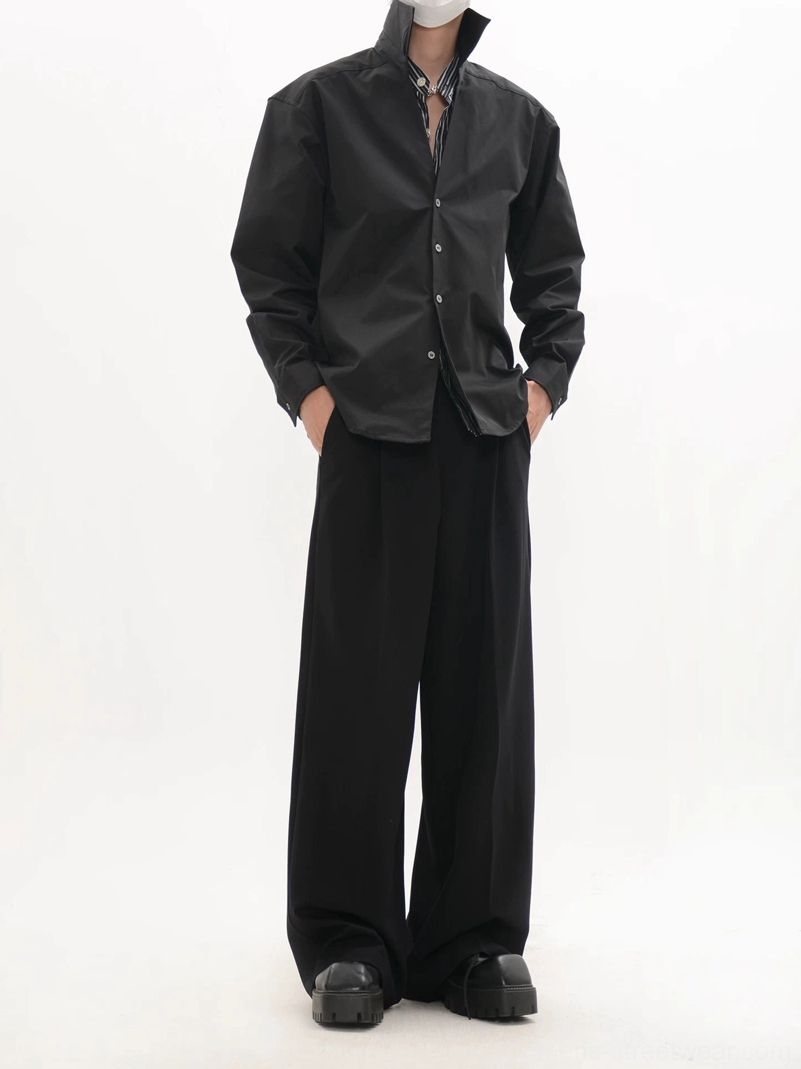 Black relaxed fit long-sleeve button-front shirt with open collar styled as minimalist Korean streetwear