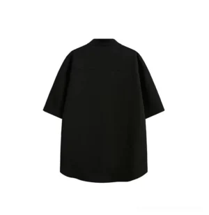 Black relaxed fit short sleeve mandarin collar utility shirt with curved hem back view