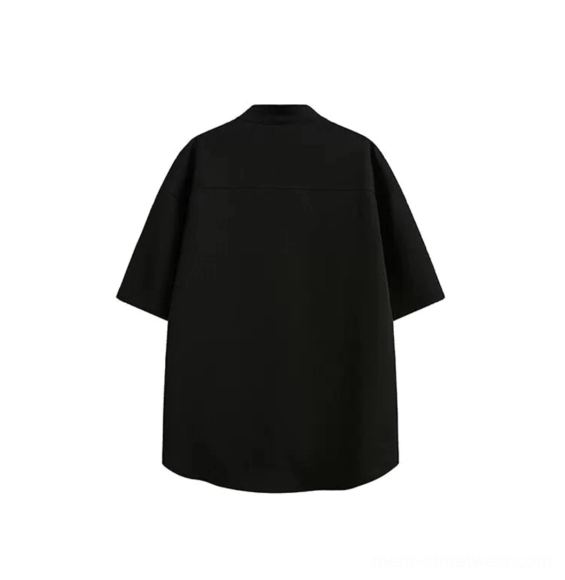 Black relaxed fit short sleeve mandarin collar utility shirt with curved hem back view