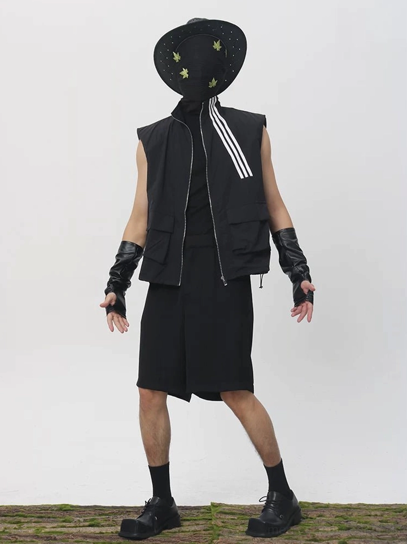 Black relaxed wide-leg Bermuda shorts with structured tailored waist styled with a utility vest for modern Korean streetwear fashion