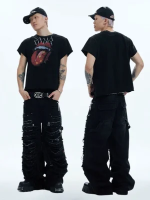 Front and back full-body view of black rhinestone distressed cargo jeans styled with a graphic T-shirt, metal belt, baseball cap, and thick-soled leather shoes