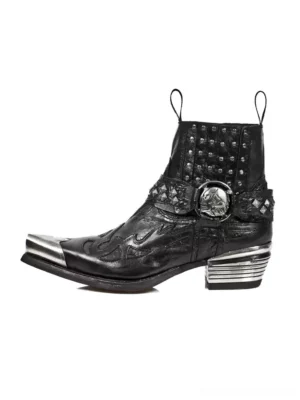 Black rivet buckle pointed toe Chelsea boots with metallic toe cap and block heel left angled product view