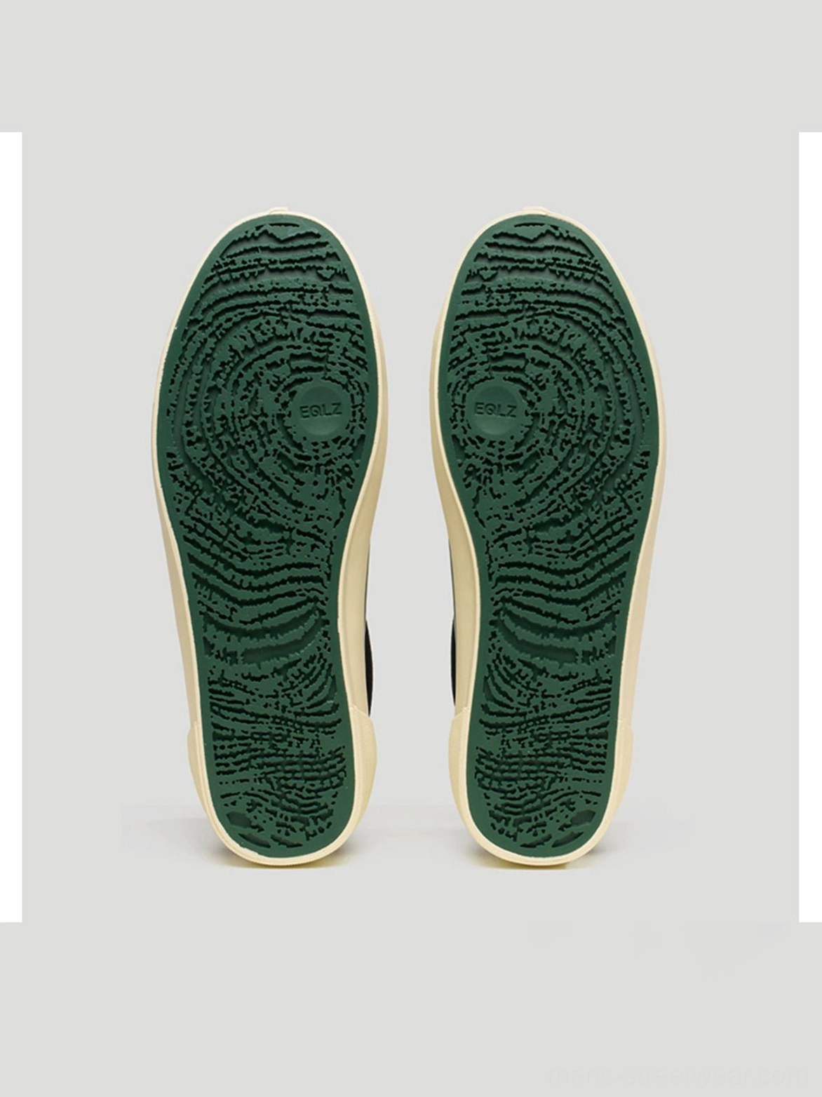 Black rose embroidered low-top skate shoes styled as a unisex streetwear footwear essential