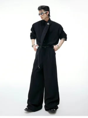 Black scarf collar wide-leg suit set styled on a male model in a minimalist studio with rolled sleeves, knotted stand collar, drawstring waist, and relaxed Korean streetwear tailoring