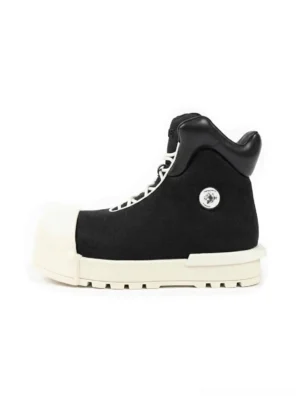 Black sculpted-toe platform high-top boot side profile with off-white oversized toe cap and thick sculpted sole
