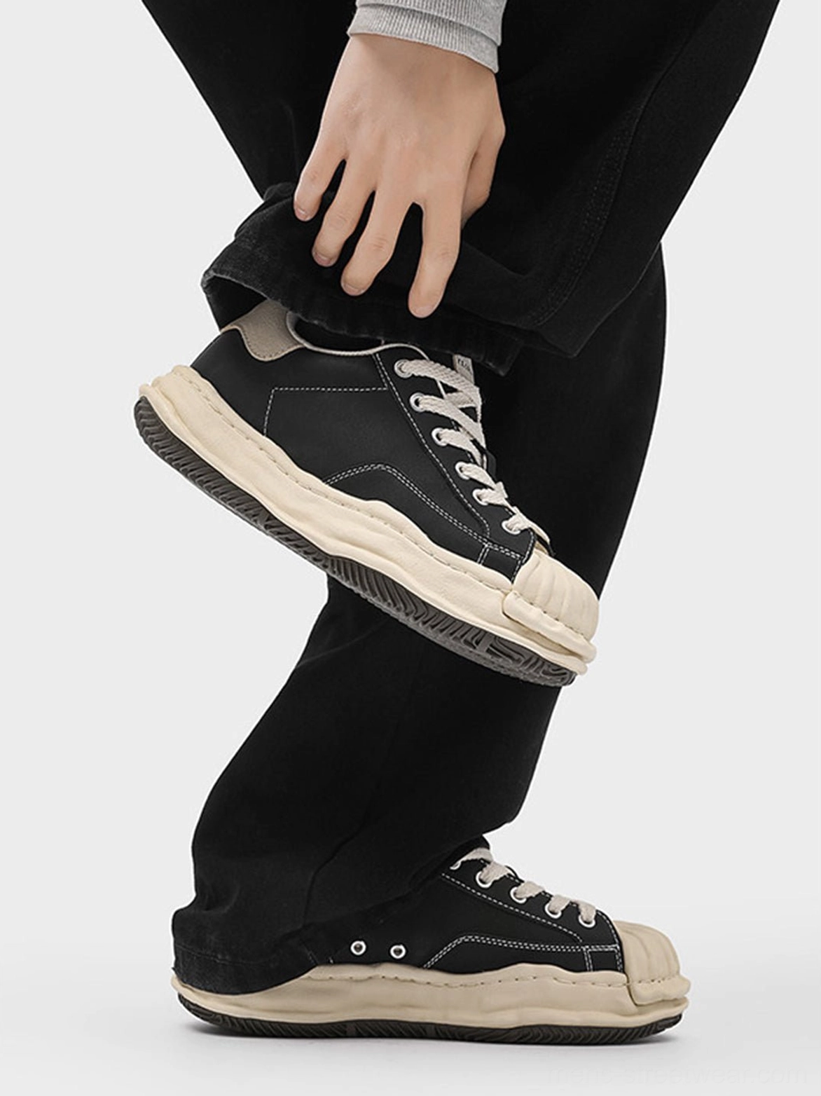 Black shell-toe platform sneakers designed for wide-leg jeans, relaxed trousers, Acubi fashion, and everyday urban styling
