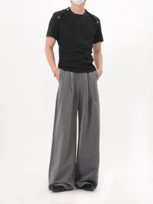 Black fitted shoulder snap knit tee full front view with crew neckline, subtle knit texture, and streamlined Korean streetwear silhouette