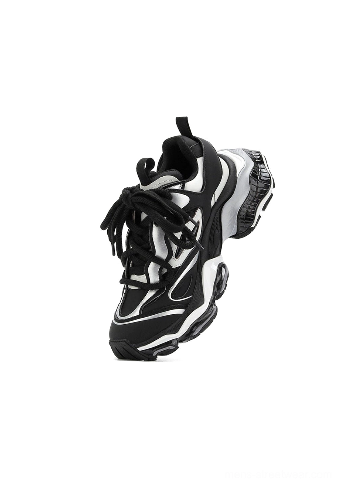 Single black and silver air-cushioned runner sneaker shown from the rear side angle with heel pull tab, layered leather upper, silver trim, and curved chunky midsole