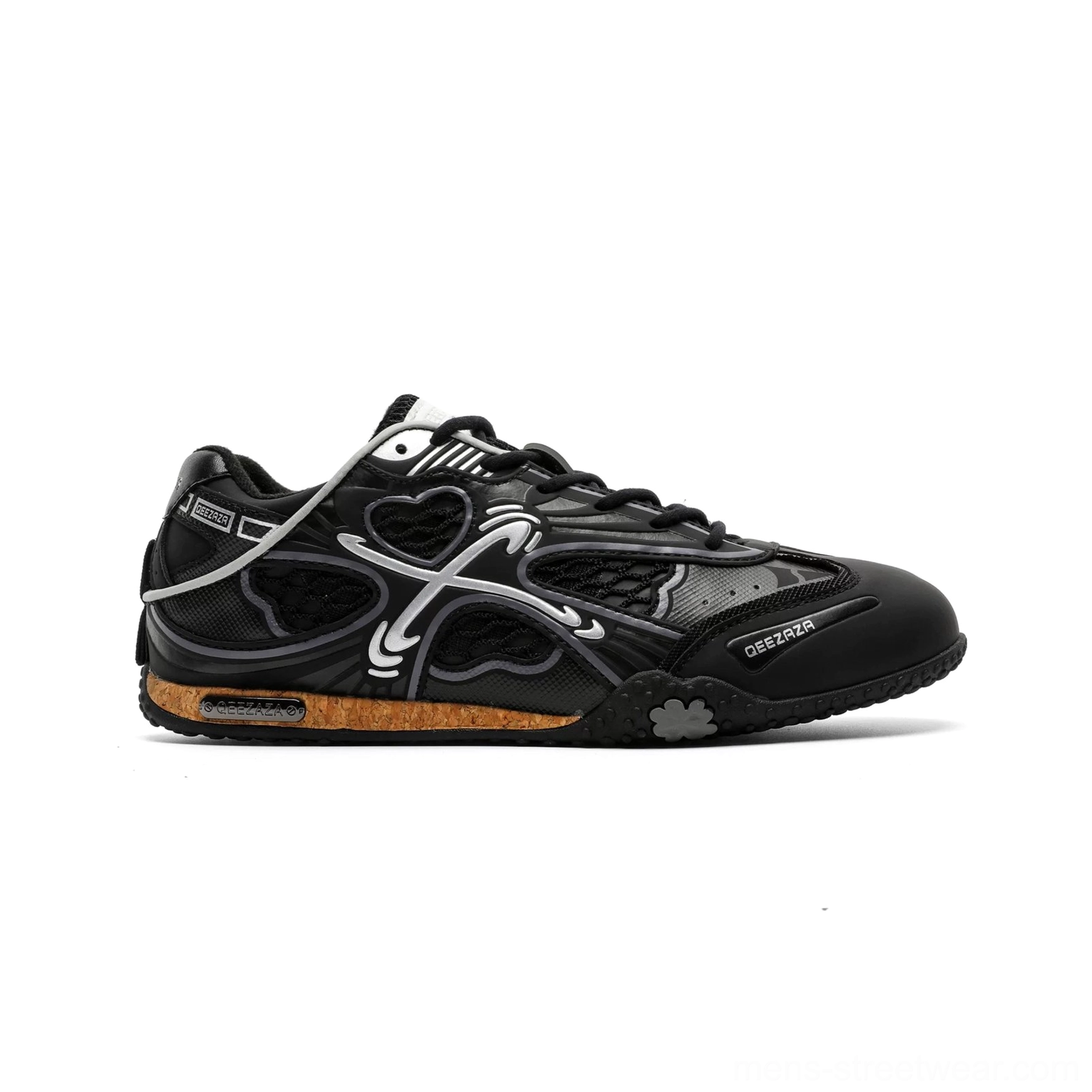 Side profile of black and silver heart mesh retro sneakers with black glossy toe cap, silver decorative overlays, heart-shaped mesh panels, and cork-look flat outsole trim