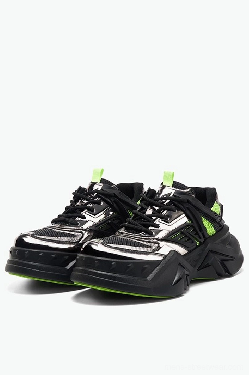 Black silver and neon green breathable cyberpunk chunky sneakers with jagged techwear rubber sole front view
