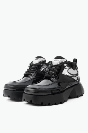 Black and silver square-toe patent platform chunky sneakers pair in front three-quarter view with lace-up upper and oversized lug sole