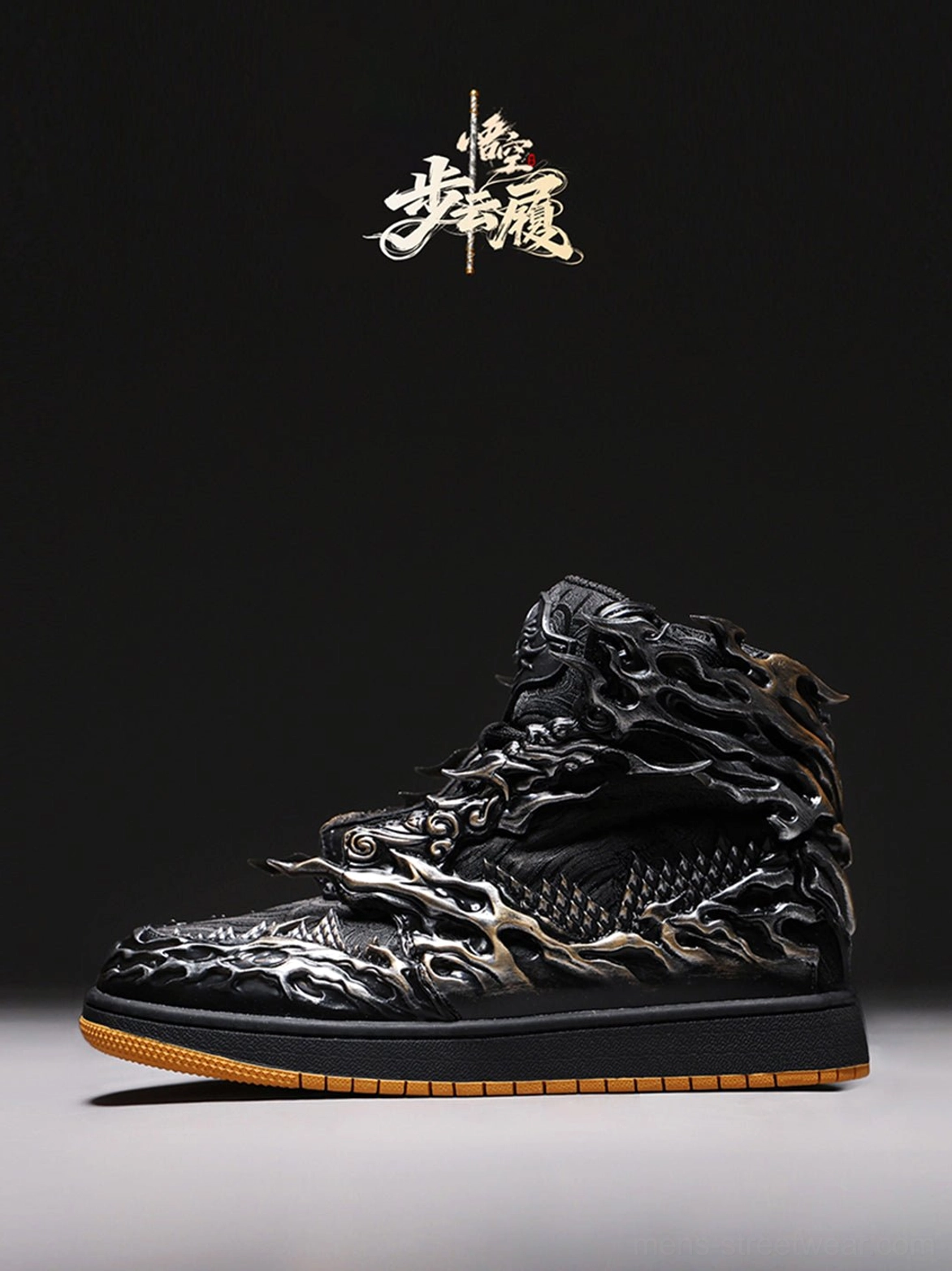 Three-quarter rear studio view of black silver Wukong cloud relief high-top sneakers with textured heel and gum outsole