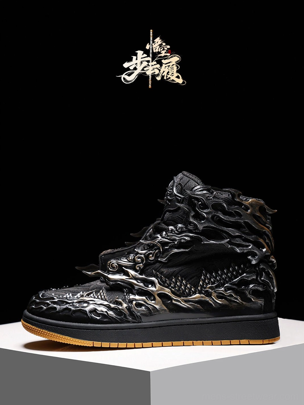 Left side profile of black and silver Wukong relief high-top sneakers showing lace area embossed clouds and gum rubber sole