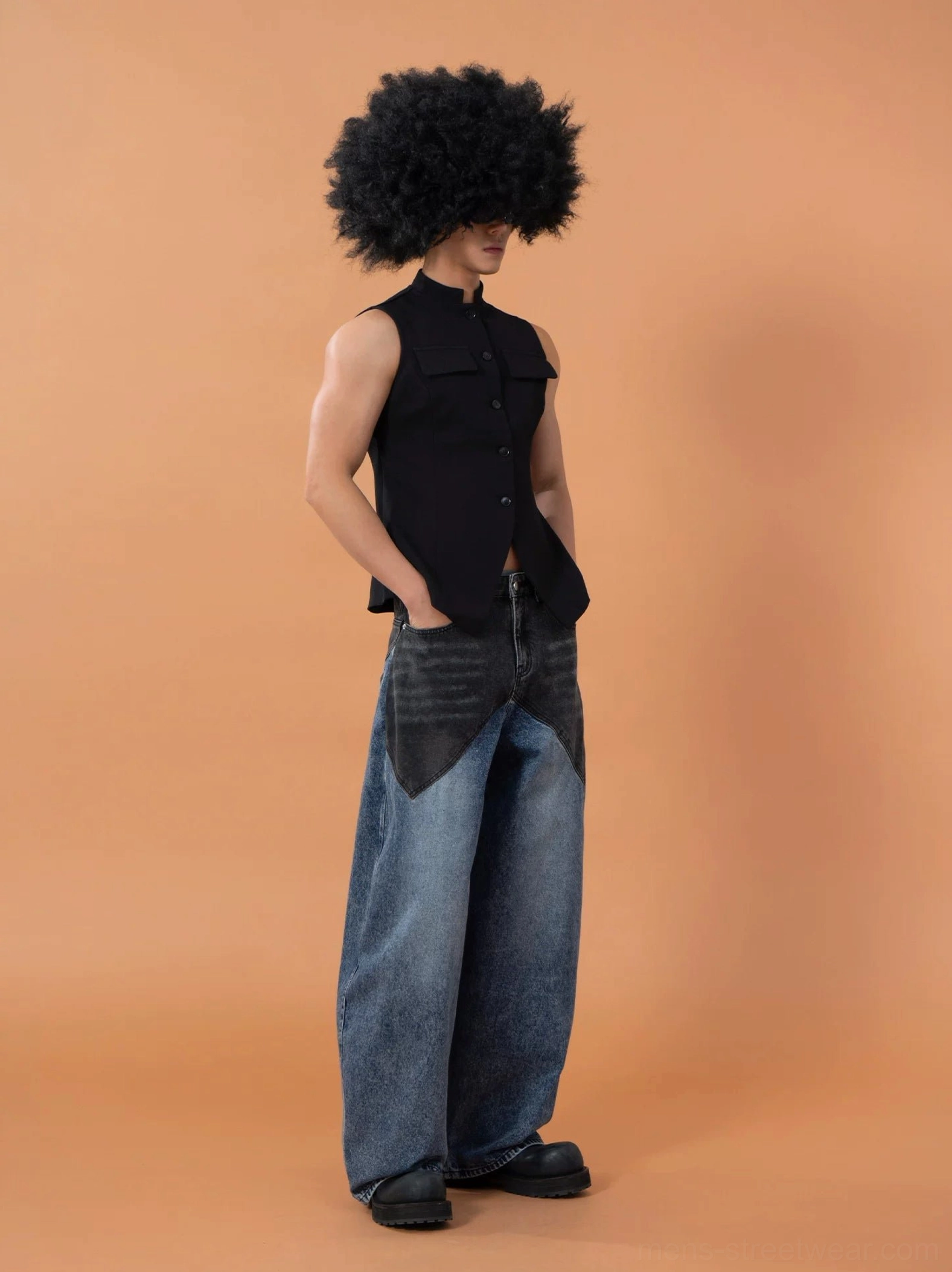 Left side profile of a black slim-fit tailored vest with clean side seams, structured shoulders, cropped hem, and modern Korean streetwear proportions